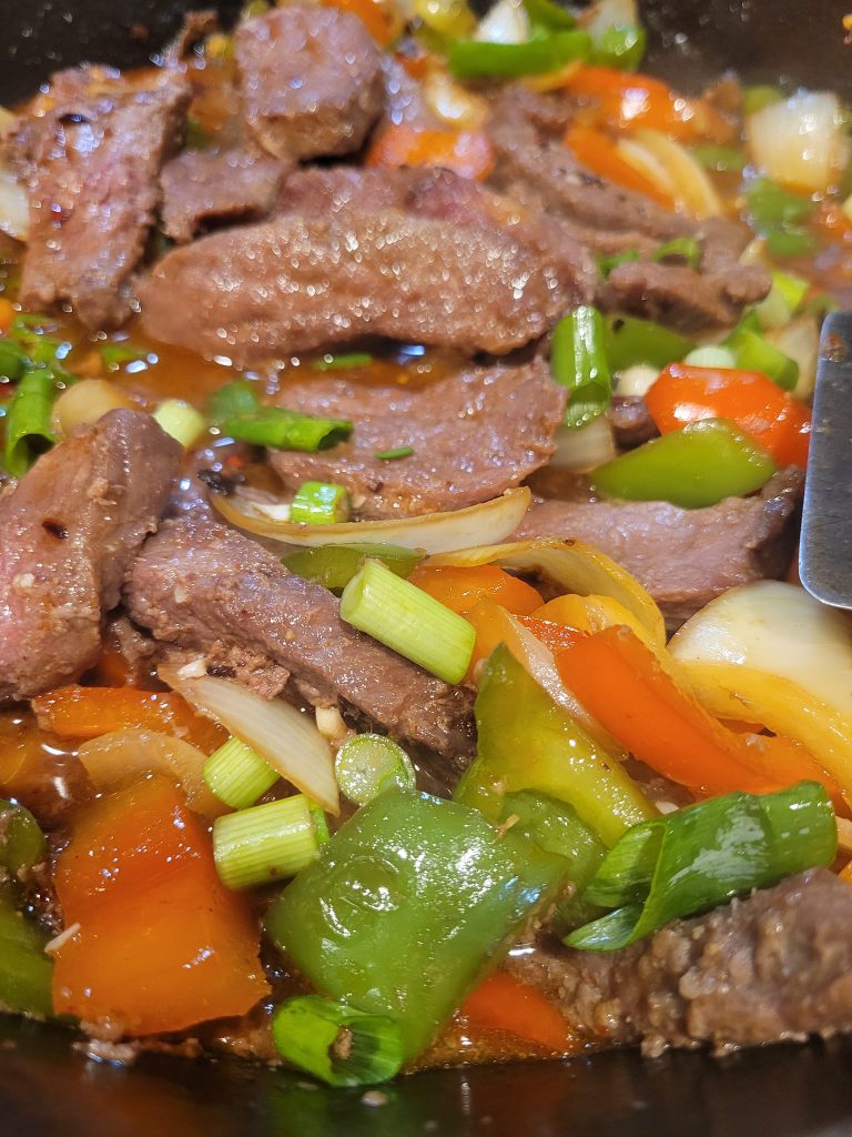 Beef stir-fry with mixed colorful vegetables